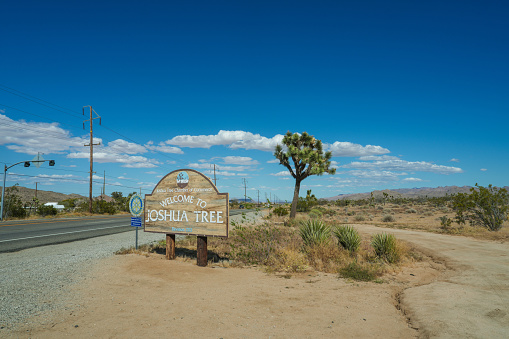Joshua Tree California USA, May 6, 2023:Joshua Tree welcome sign along the road