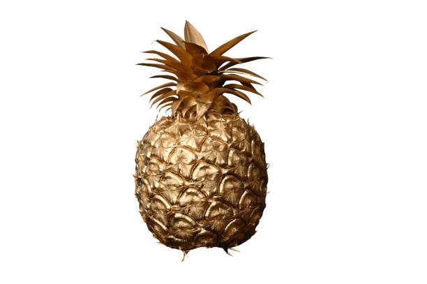 istock golden pineapple on white background.clipping path 1557213386