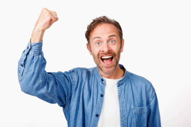 istock Portrait of Caucasian man with cheering pose 1557218089