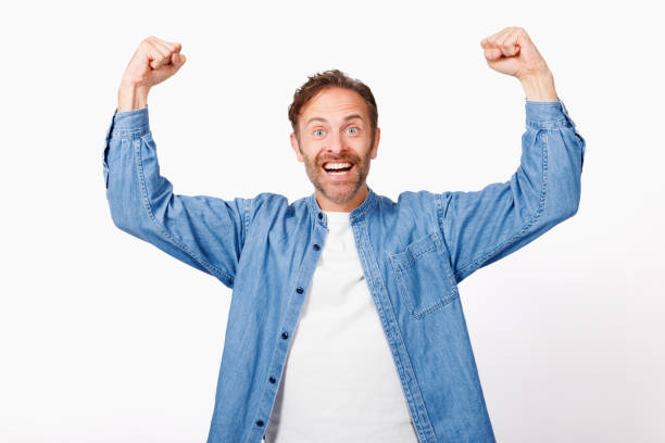 istock Portrait of Caucasian man with cheering pose 1557218092
