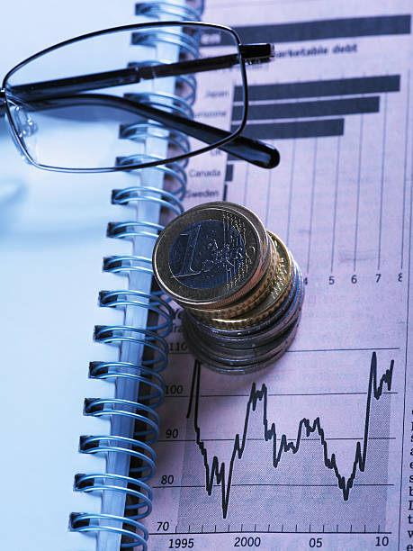istock Financial Chart with Glasses And Coins 155722621
