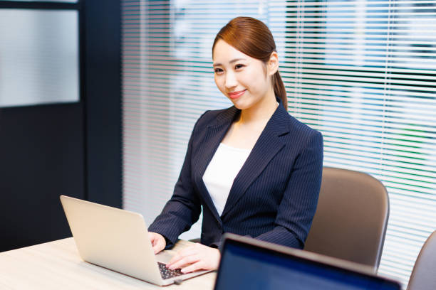 istock Asian businesswoman at work 1557240793