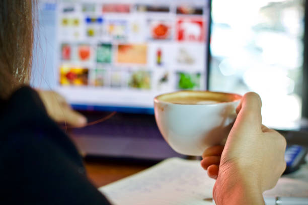 coffee cup hot using laptop notebook desk working drink cafe office mug morning women