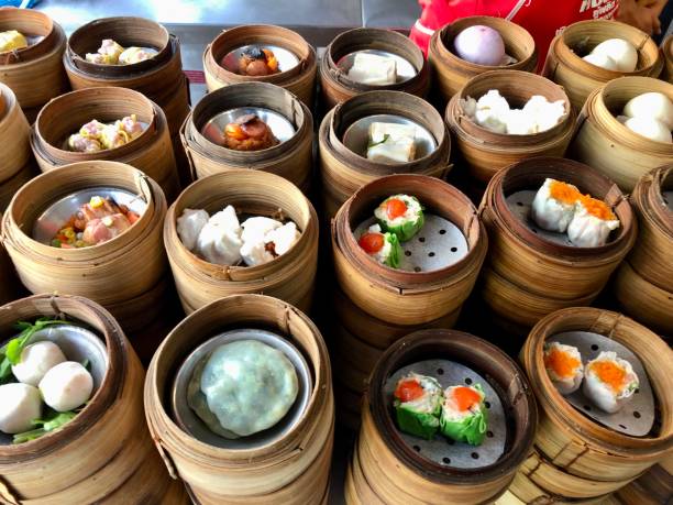 istock Variety of dim sum dishes 1557261706