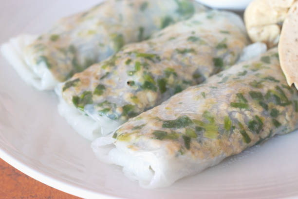 istock Vietnamese steamed rice noodle roll with pork inside. 1557263798