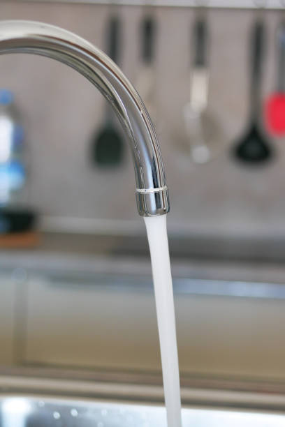 istock water pouring from a faucet tap slow motion 1557264701