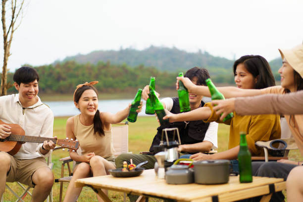 istock Group of people enjoy with camping. 1557265041