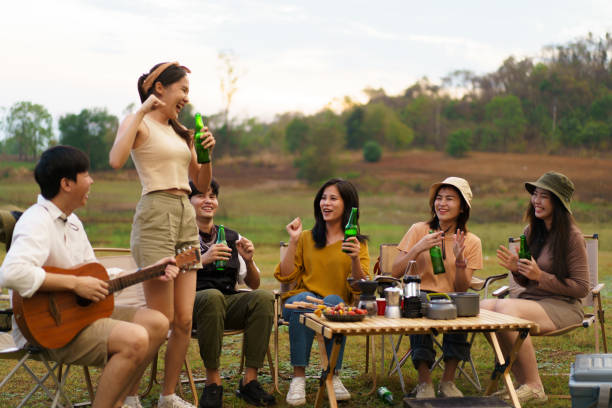 istock Group of people enjoy with camping. 1557265043
