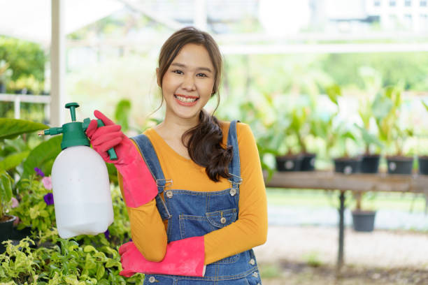 istock female gardener portrait. 1557265246