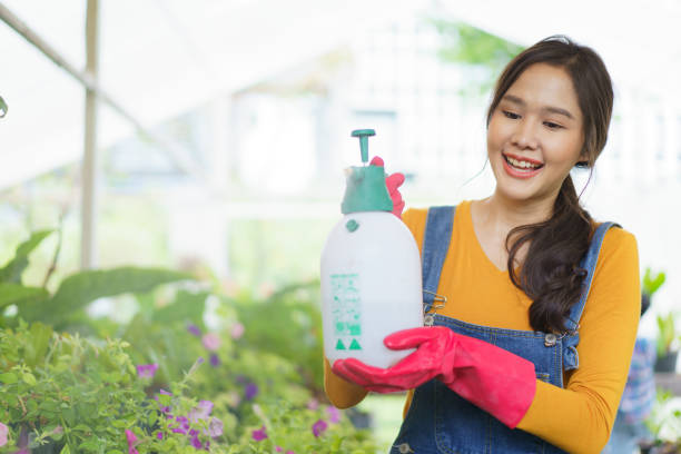 istock female gardener portrait. 1557265248