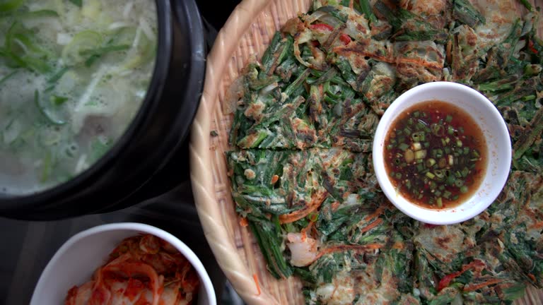 Korean food seafood pancake ox beef bone soup side dishes Seolleongtang Haemul pajeon banchan