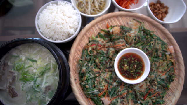 Korean food seafood pancake ox beef bone soup side dishes Seolleongtang Haemul pajeon banchan