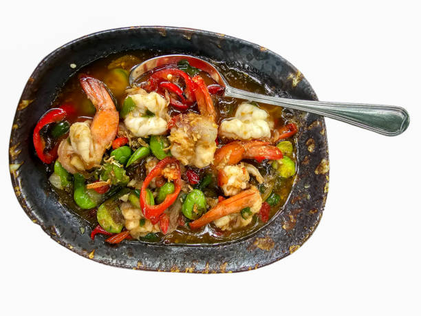 istock Isolated Stir-fried Stink Bean and Prawn on white background. 1557311700