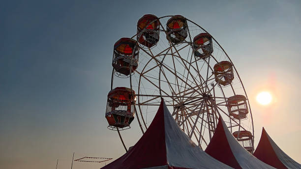 istock Ferris wheel family carnival 1557332852