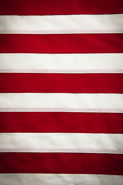 istock American Flag, red and white stripes background 155737377