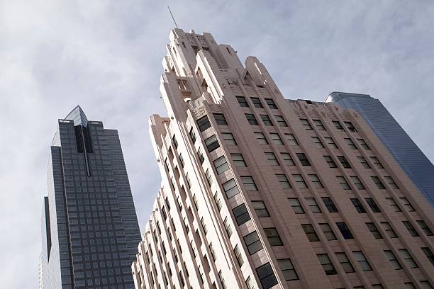 istock Downtown Buildings Against Cloudy Sky 155737636