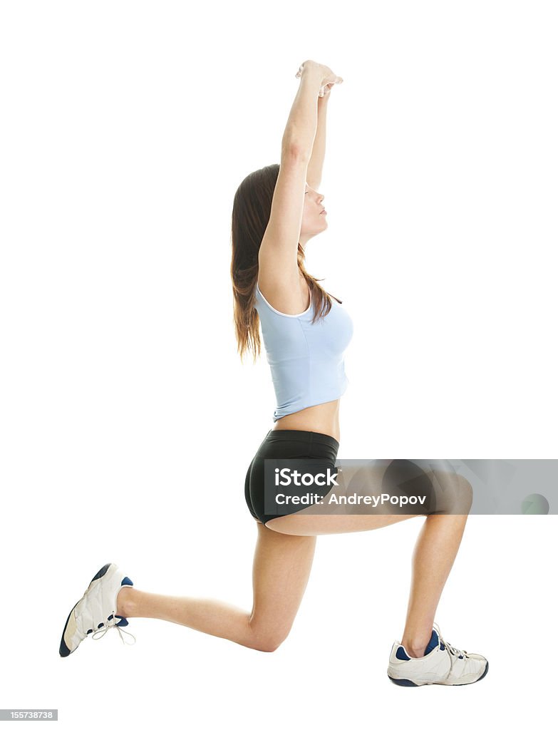 Fitness woman doing lunge exercise Fitness woman doing lunge exercise. Isolated on white Active Lifestyle Stock Photo