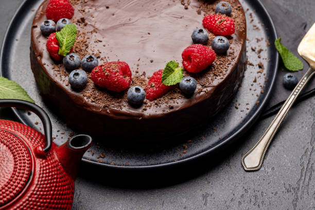 istock Chocolate cake dessert with fresh berries 1557428125