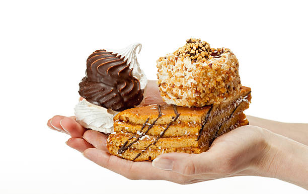 istock Hands holding delicious sweet cakes 155744943