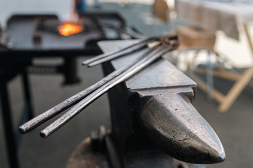 Anvil in the forge. The hammer is on the anvil.