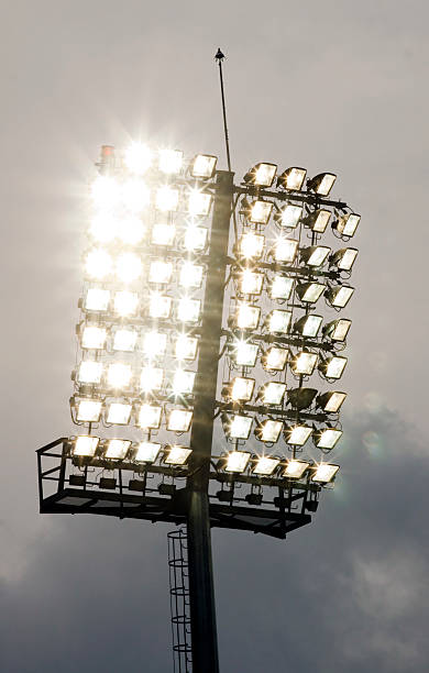 istock Stadium lights and dark blue sky 155745591