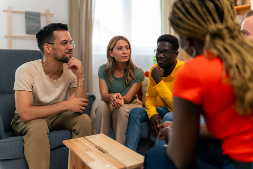 Sharing experiences during a group therapy session