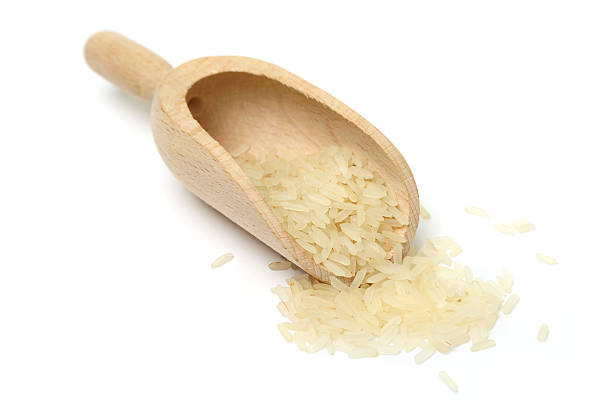 istock Rice in a wooden scoop 155745902