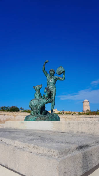 Close view of the ancient sculpture Le Dresseur d'oursons in Marseille in South France Marseille, France - May 29, 2023: Close view of the ancient sculpture Le Dresseur d'oursons in Marseille at South France marseille panier stock pictures, royalty-free photos & images