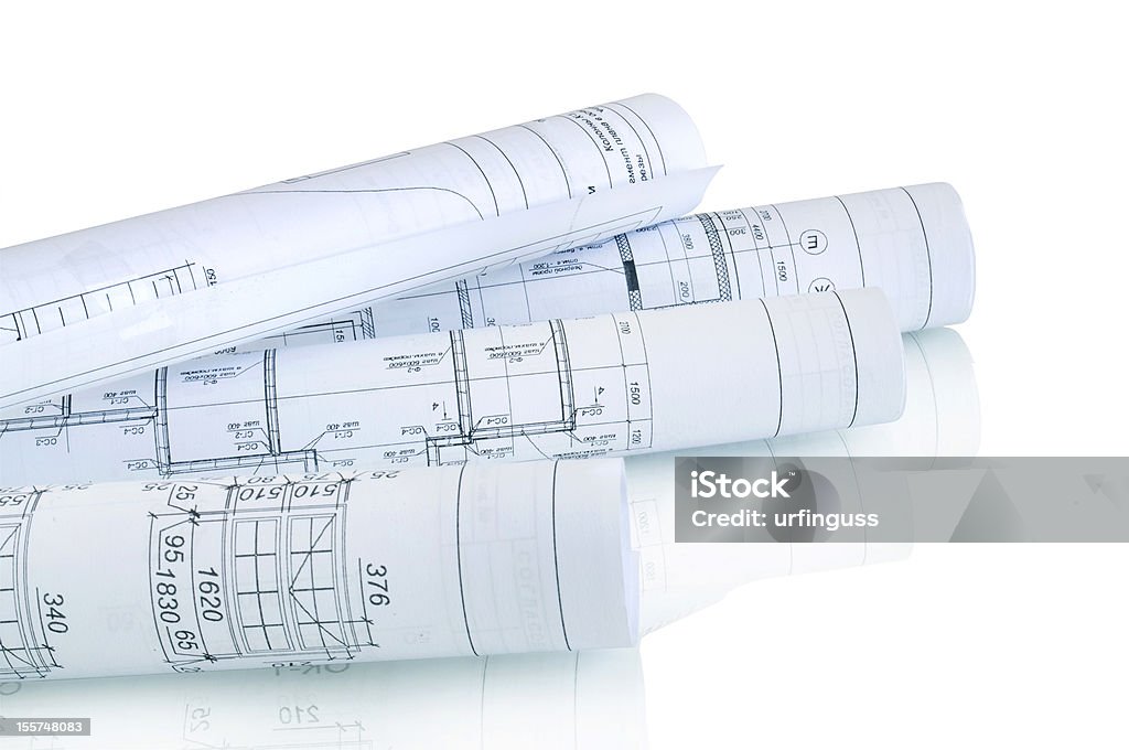 Planos de construção em rolls isolada no branco - Foto de stock de Arquitetura royalty-free