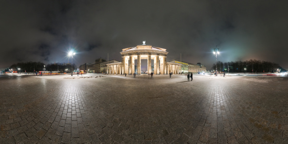 Brandenburg Gate in Berlin, Germany. Panorama is made late cloudy January evening. 360 degree panoramic composition.