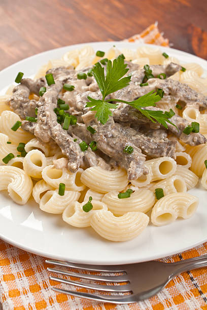 istock Beef Stroganoff with pasta on the plate 155748504