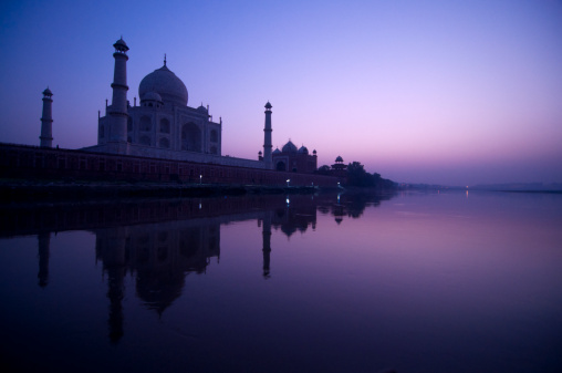 Taj Mahal in twilight view, water reflection of yamuna river