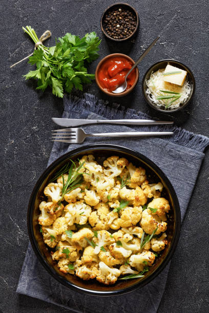 istock baked cauliflower florets with parmesan and herbs 1557492689