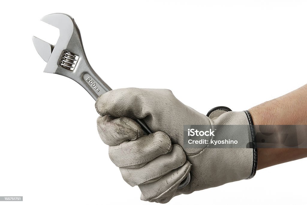 Isolé photo de travail main avec clé sur fond blanc - Photo de Clé de serrage libre de droits