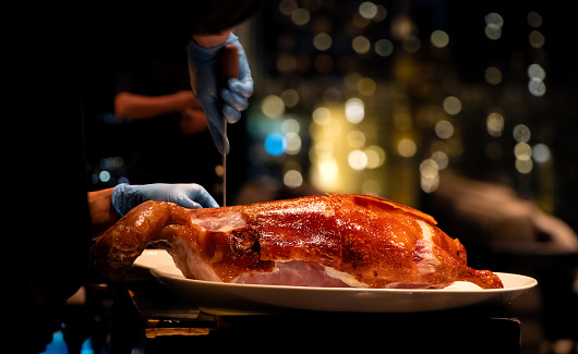 Cutting of Peking Roast Duck,Chinese style dishes that are famous in Thai restaurants.