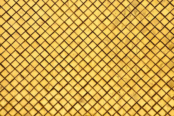 Photo of Mosaic wall reflection at Wat Phra Keaw golden temple ,Bangkok