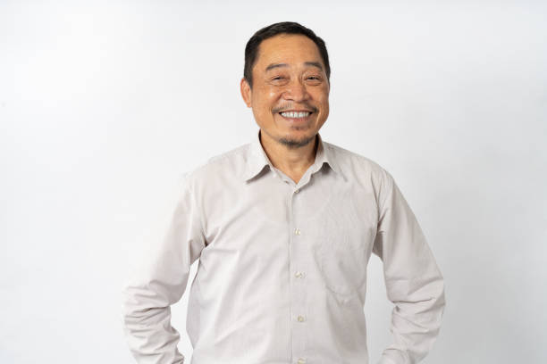 istock Portrait Asian Mature Man Showing Expression and Emotion on Face in studio 1557574581