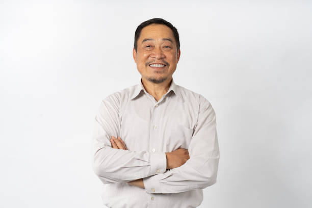 istock Portrait Asian Mature Man Showing Expression and Emotion on Face in studio 1557574587