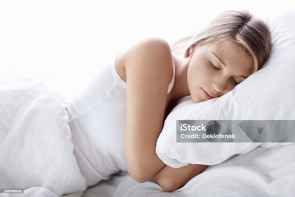 Sleeping girl Young girl sleeping in bed 20-29 Years Stock Photo