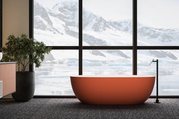 istock Modern minimalist bathroom interior with orange bathtub 1557613725