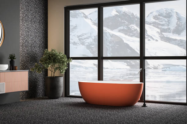 istock Modern minimalist bathroom interior with orange bathtub 1557615307