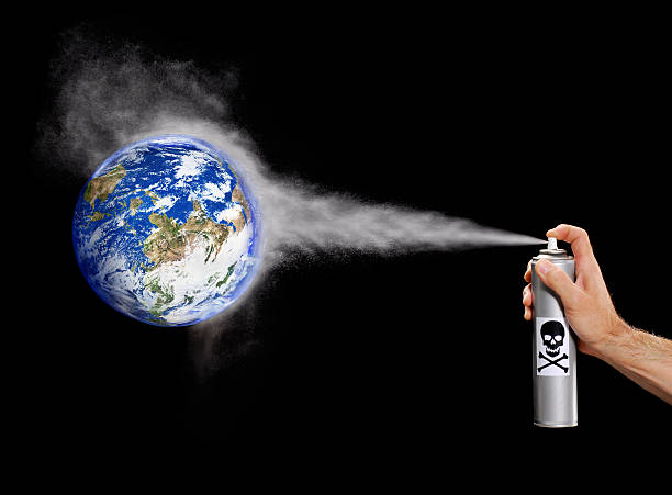 No more pollution. Spray Polluting the planet earth. ecological reserve photos stock pictures, royalty-free photos & images