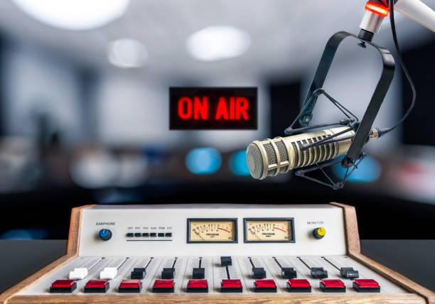 istock Professional microphone and on air sign 1557662959