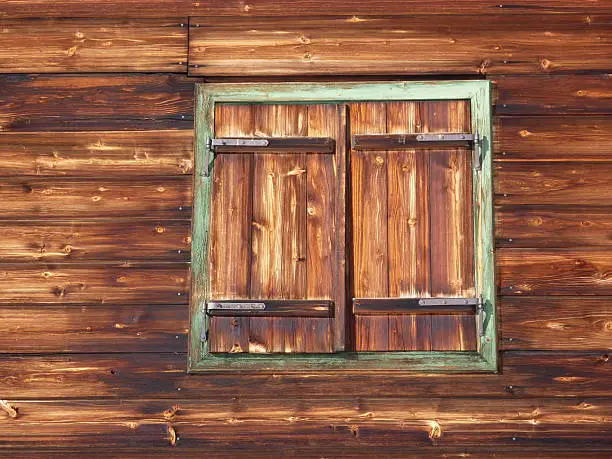 Wood windows in a mountain hut