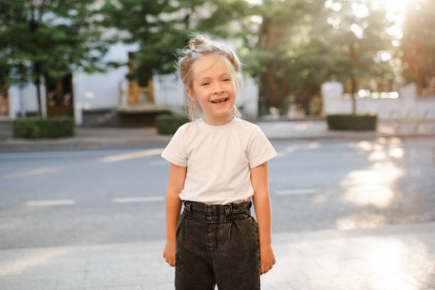 istock Funny child having fun outdoor 1557677376