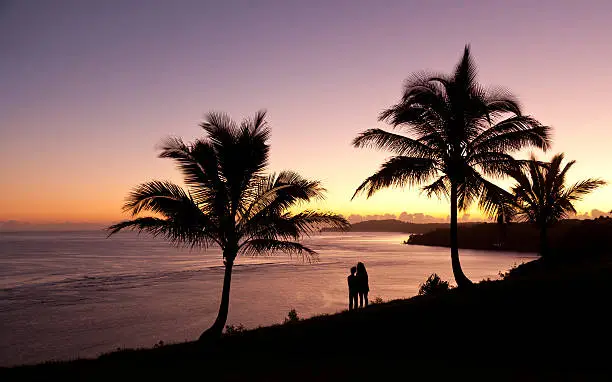 Photo of Couple watching sunrise in Kauai