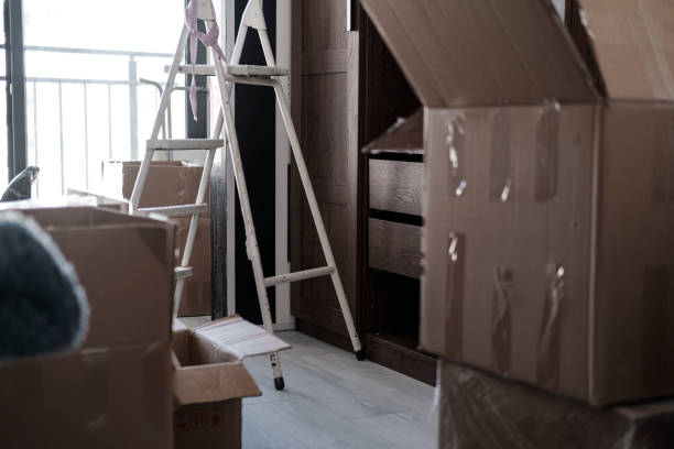 istock house moving, packed unpacked carton boxes, messy home 1557705495