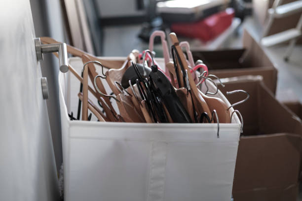 istock moving house , empty clothes hangers, giveaway day, charty, relocation move 1557706022