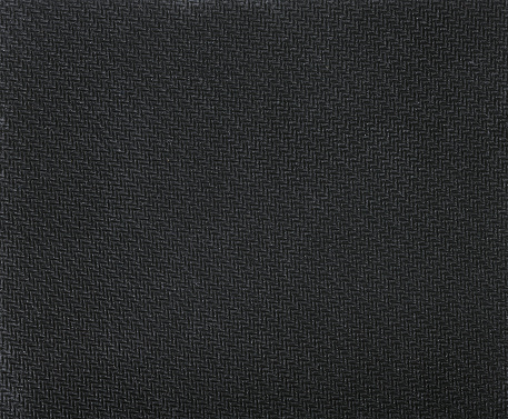 Black rubber background with texture.