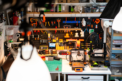 Home workshop. Tools wall. Creative place, home factory. 3D printers